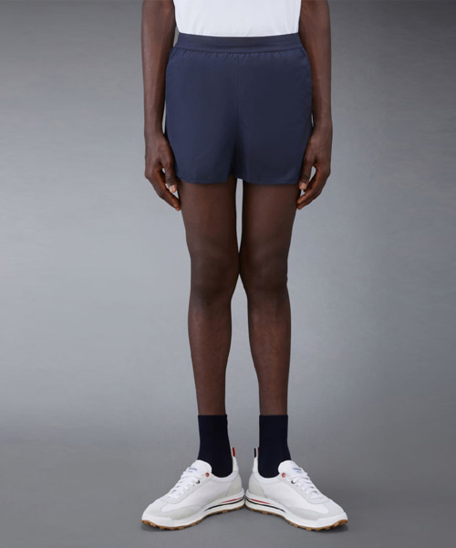 P-15729<br><b>THOM BROWNE</b><br>플라이웨이트 테크 4-바 러닝 쇼츠</b><br>[매장가-90만원대]