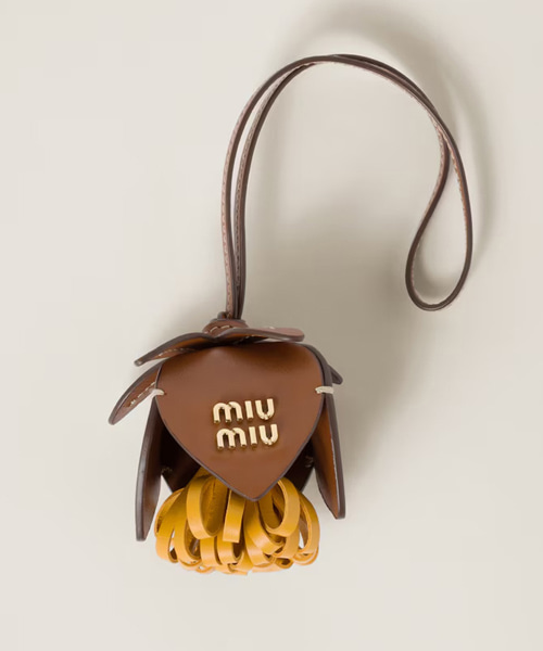 A-42147<br><b>MIU MIU</b><br>가죽 트릭</b><br>[매장가-50만원대]